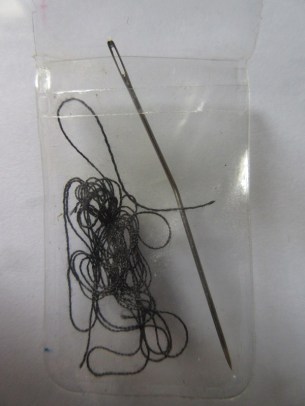 Needle and thread also go into my first-aid / repair kit, a savior for so many occasions.